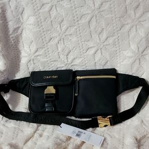 A NWT #28 Calvin Klein fancy fanny pack.